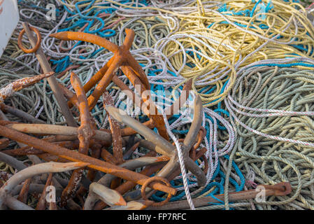 close up view of various sea anchors and ropes of various coloures, lengths and thickness's for inshore fishing. Stock Photo