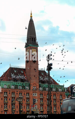 Pigeons flying around, Scandic Palace Hotel, Copenhagen, Denmark Stock Photo