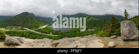 Panoramic of Cannon Mountain in Franconia Notch State Park from Artists Bluff in the White Mountains off New Hampshire USA. Stock Photo