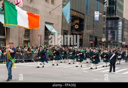 Limerick Pipe and drum marching band parading during the 2016 St Patrick's Day celebrations in New York City, USA. Stock Photo