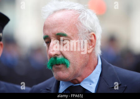 New York City, USA, 17 March 2016. St Patrick's Day parade:  FDNY marcher in green mustache Credit:  Andrew Katz/Alamy Live News Stock Photo