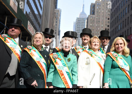 New York City, USA, 17 March 2016. St Patrick's Day parade:  St Patrick's Day parade aides pose in uniform along 5th Ave prior to start of the parade Credit:  Andrew Katz/Alamy Live News Stock Photo