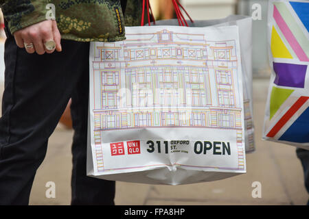 Oxford Circus, London, UK. 18th March 2016. Uniqlo reopen their flagship store on Oxford Street after a year of redevelopment. Stock Photo