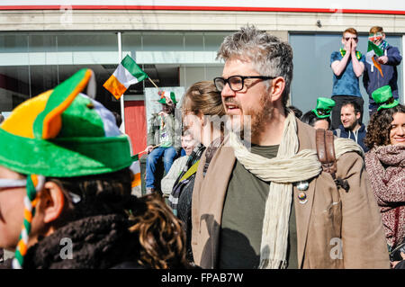 Belfast, Northern Ireland, UK. 17th March, 2016. Comedian Phil Jupitus joins the crowd to watch the annual Saint Patrick's Parade. On the previous evening, he and Jason Manford had an awkward appearance on the Nolan Show. Credit:  Stephen Barnes/Alamy Live News Stock Photo