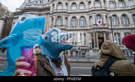 London, UK.  18 March 2016.  Demonstrators gather outside the Japanese Embassy on Piccadilly to protest against the killing of dolphins in Taiji, Japan as well as the cruelty to keeping such mammals in captivity.  This protest comes a day after SeaWorld in the USA announced that it is ending its controversial orca breeding programme. Credit:  Stephen Chung / Alamy Live News Stock Photo