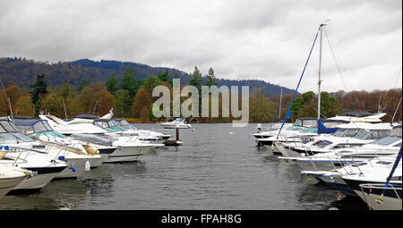 Yachts, moror boats, vessels at anchor on lake windermere, lake district, UK in winter Stock Photo