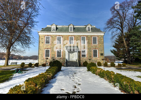 Historic Georgian 1748 Van Cortlandt Manor House built in dressed fieldstone with a double-hipped roof in Bronx, New York Stock Photo