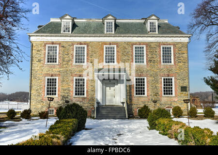 Historic Georgian 1748 Van Cortlandt Manor House built in dressed fieldstone with a double-hipped roof in Bronx, New York Stock Photo