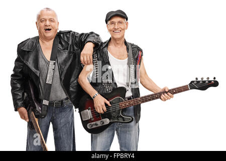 Senior punk guitarist and bass player posing together isolated on white background Stock Photo