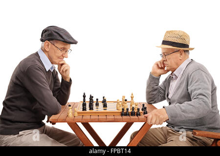 Senior Man Contemplating On His Next Move In Chess Game Stock Photo,  Picture and Royalty Free Image. Image 39013564.