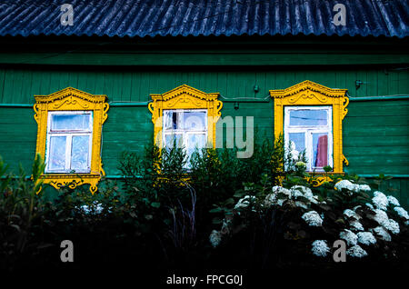 Three traditional Russian wooden windows in Tarusa Stock Photo