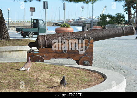 Old cannon exposed on the seafront in Italy, Diano Marina Stock Photo