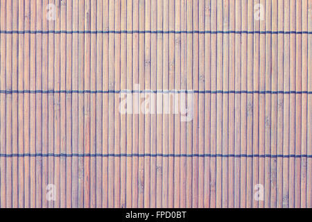 Vintage toned bamboo mat background or texture. Stock Photo