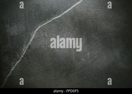 Dark grunge stone background, close up of a slate. Stock Photo