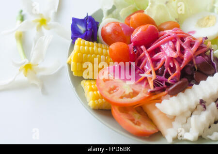 Fresh vegetable salad with beetroot sauce Stock Photo