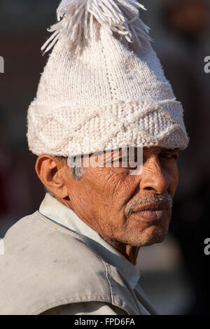 Nepal, Patan.  Elderly Nepalese Man Wearing a Traditional White Knit Hat. Stock Photo