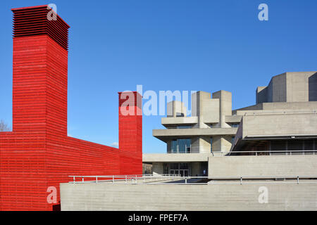 Red Shed temporary Theatre space contrasted board finish brutalist concrete architecture of original National Theatre South Bank Lambeth London UK Stock Photo