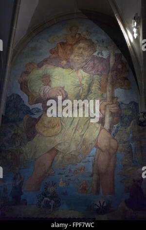 Saint Christopher. Renaissance mural painting from the beginning of the 16th century in the Herrgottskirche Church near Creglingen, Baden-Wurttemberg, Germany. Stock Photo