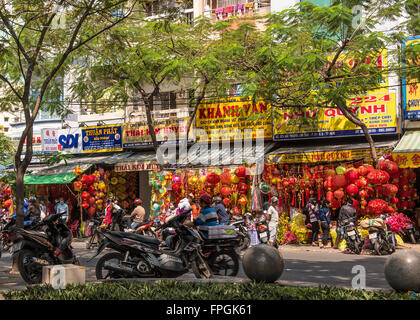 HO CHI MINH, VIETNAM - JANUARY 26, 2016: Shops selling decorations for Tet, the Vietnamese New Year which takes place on Februar Stock Photo