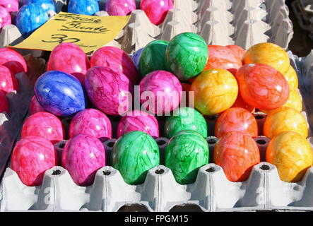 Colourful Easter eggs on display, farmers market, Germany. Stock Photo