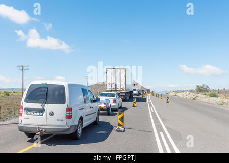 CRADOCK, SOUTH AFRICA - FEBRUARY 19, 2016: Stop and go delay at road works on the N10 road between Cradock and Cookhouse in the Stock Photo