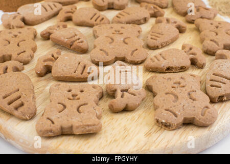 figure ginger cookies on a wooden board Stock Photo