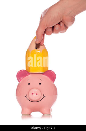 Piggy bank saving for education cutout Stock Photo