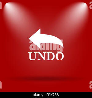 Undo icon. Flat icon on red background. Stock Photo