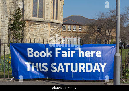 banner advertising a book fair, st john the evangelist church, kingston upon thames, surrey, england Stock Photo