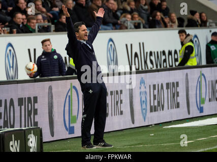 Wolfsburg, Germany. 19th Mar, 2016. Darmstadt's coach Dirk Schuster during the German Bundesliga soccer match between VfL Wolfsburg and SV Darmstadt 98 at the Volkswagen arena in Wolfsburg, Germany, 19 March 2016. The game ends 1:1. PHOTO: PETER STEFFEN/dpa (EMBARGO CONDITIONS - ATTENTION: Due to the accreditation guidlines, the DFL only permits the publication and utilisation of up to 15 pictures per match on the internet and in online media during the match.) © dpa/Alamy Live News Stock Photo
