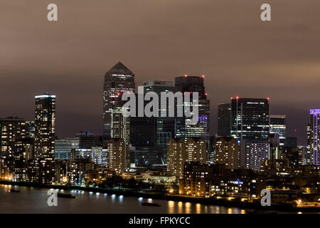 London, UK. 19th March, 2016. ‘Earth Hour’ lights out over Canary Wharf business park buildings Credit:  Guy Corbishley/Alamy Live News Stock Photo