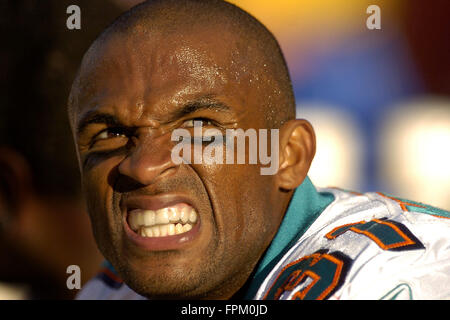 Dec 10, 2006; Miami Gardens, FL, USA; Miami Dolphins running back Sammy  Morris runs by the Patriots Mike Vrabel during fourth quarter action Sunday  afternoon at Dolphin stadium. Dolphins 21-0 over the