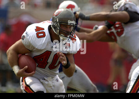 Tampa Bay Buccaneers' fullback Mike Alstott (40) goes head-to-head with  Detroit Lions' linebacker Boss Bailey (97) at Raymond James Stadium Oct. 2,  2005 in Tampa, Fl. The Buccaneers beat the Lions 17-13