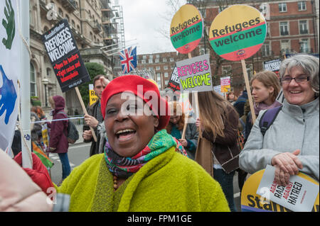 London, UK. Saturday 19th March 2016. Thousands gather to  march through London from the BBC in a national demonstration organised by Stand Up to Racism against racism, Islamophobia, anti-Semitism and fascism and to say clearly that refugees are welcome here. The march started at the BBC which many marching say needs a more positive attitude to refugees and fails to report protests on this and other issues and ended in a rally in Trafalgar Square. Peter Marshall/Alamy Live News Stock Photo