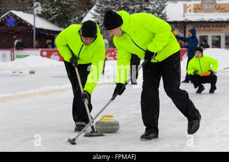 MOSCOW - JANUARY 17, 2016: Unidentified players of Russia-2 team in action during Russian Curling Champions Tour Moscow Classic 2016 on January 17, in Moscow, Russia, 2016 Stock Photo