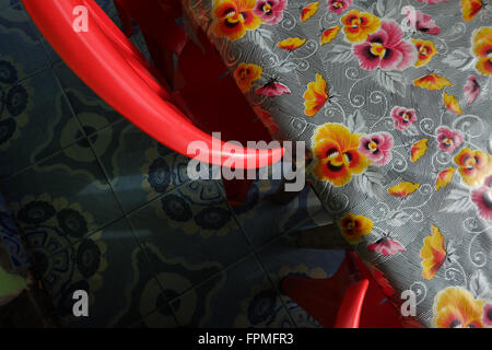 Old plastic table covers, Restaurant in Kuala Lipis, Malaysia. Stock Photo
