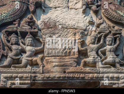 Detail of a dramatic relief with dancing girls  on the temple of Banteay Samre, Cambodia from the 12th Century. Stock Photo