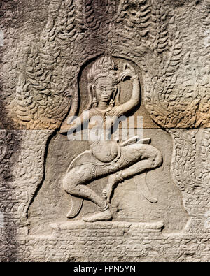 Dancing girl, apsaras or deities carved in the sandstone walls of the Banteay Kdei Temple built by Jayavarman VII in the 12th C Stock Photo