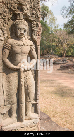 Soldier with a massive club  guarding the entrance to the Banteay Kdei  Temple built by Jayavarman VII in the 12th Century, Stock Photo