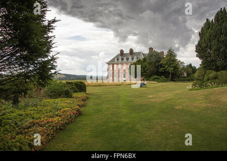 Gathering clouds above Uppark Stock Photo