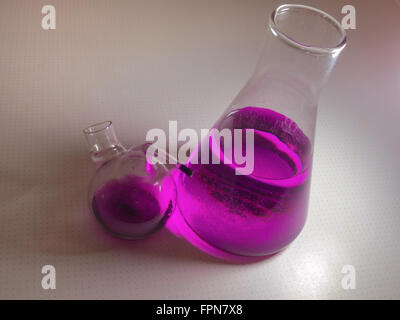 The laboratory glassware, solution of potassium permanganate Stock Photo