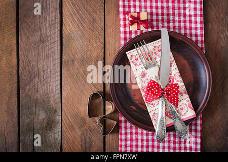 Romantic table setting for Valentines day in a rustic style. Top view Stock Photo