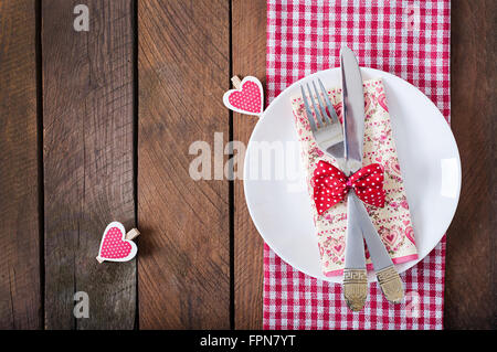 Romantic table setting for Valentines day in a rustic style. Top view Stock Photo