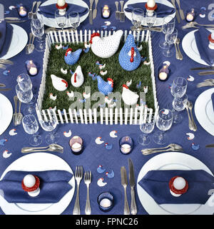 Elegant Place Setting for Easter dinner with eggs Stock Photo