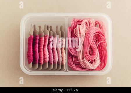 Sewing threads in pink tone. Stock Photo