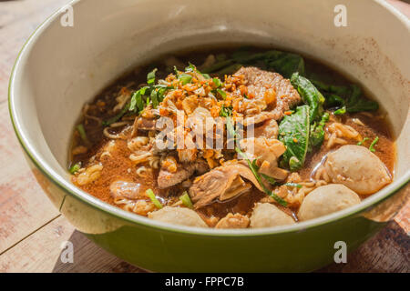 bowl of thai style beef noodle soup Stock Photo