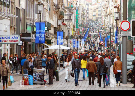 PORTO, PORTUGAL - OCTOBER 5, 2015: People walking on the main shopping street Rua de Santa Catarina in the center of Porto Stock Photo
