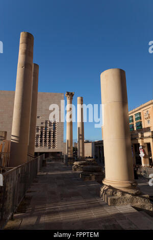 Columns of the former Royal Opera House ruined in World War II are now part of a stupendous architectural setpiece in Valletta. Stock Photo