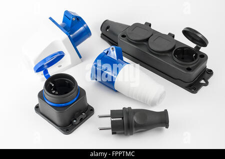 Variety of  electric power plugs and sockets isolated on white background Stock Photo