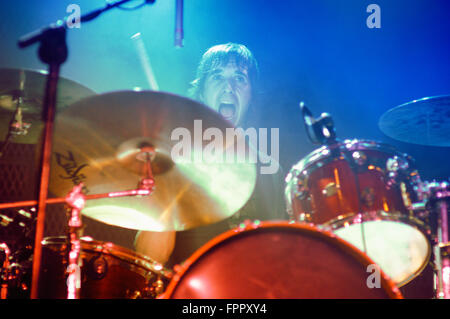 BARCELONA - JUL 2: The drummer of Sidonie (band) perfoms at Bikini stage on July 2, 2010 in Barcelona, Spain. Stock Photo